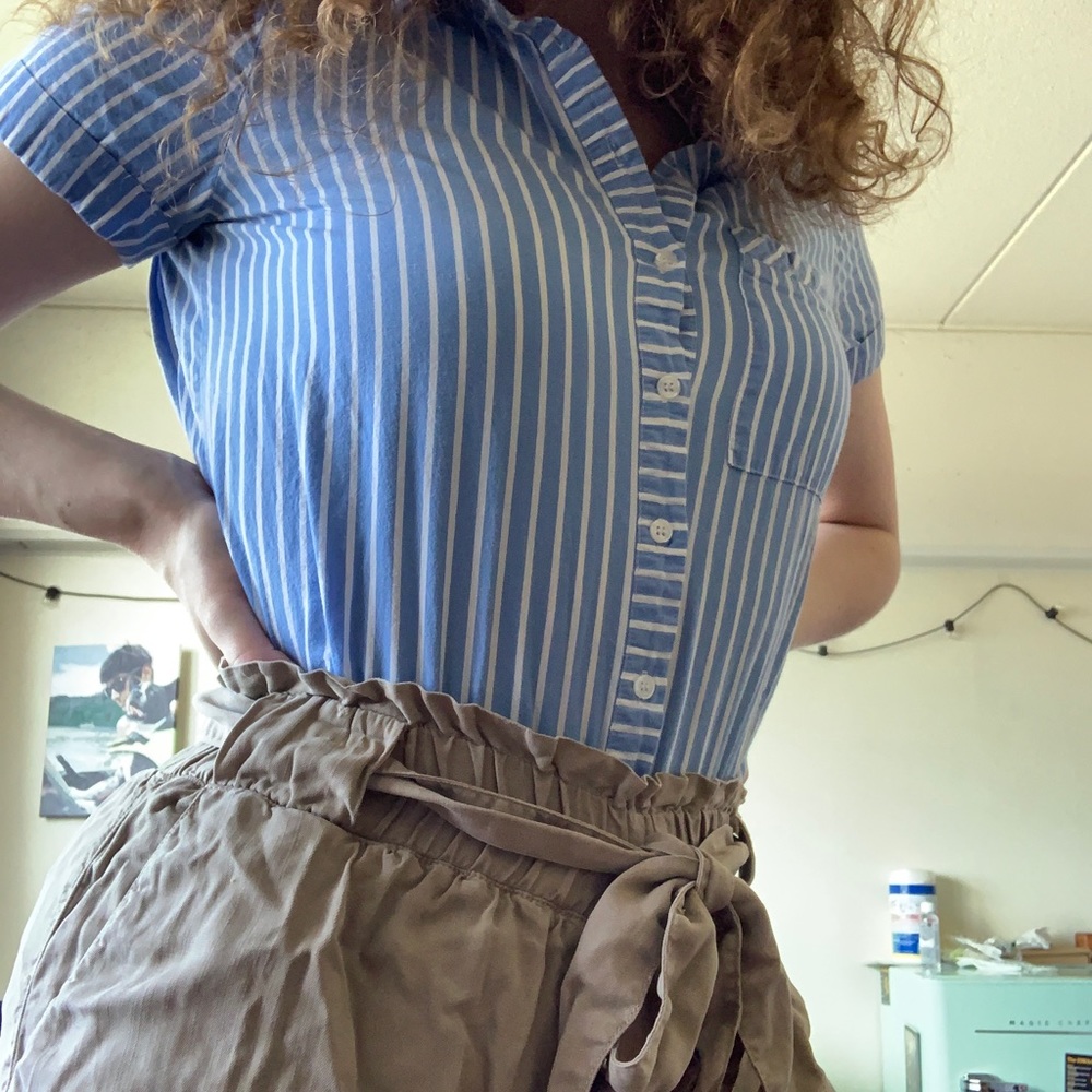Blue/white striped women’s collared button up tee